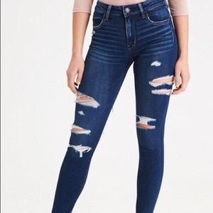 Mid Rise Distressed Skinny Jeans